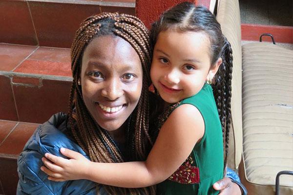 Noks Shabalala smiles with a little girl she met while serving on a Seminary mission team to Guatemala.